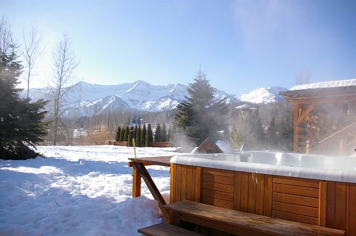 The lodge's welcoming outdoor hot tub