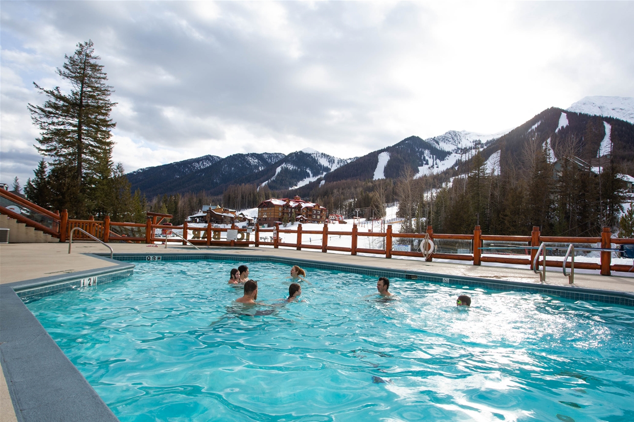 Enjoy the view from the Lizard Creek Lodge's outdoor pool and hot tubs