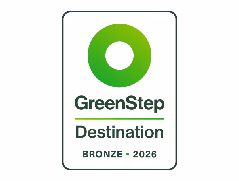 GreenStep Destination Bronze 2026 logo, green circle on white background.