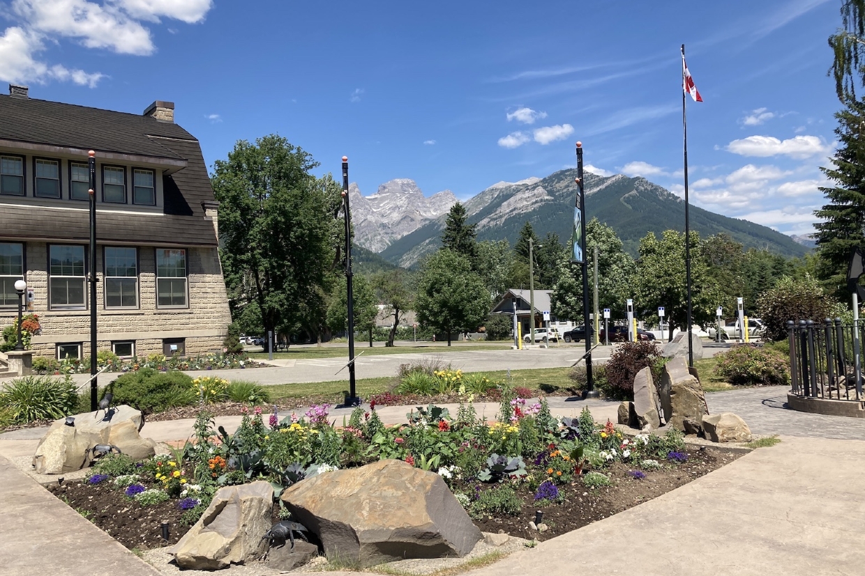 The Three Sisters from Fernie City Hall. 1pm, Monday, July 15, 2024.