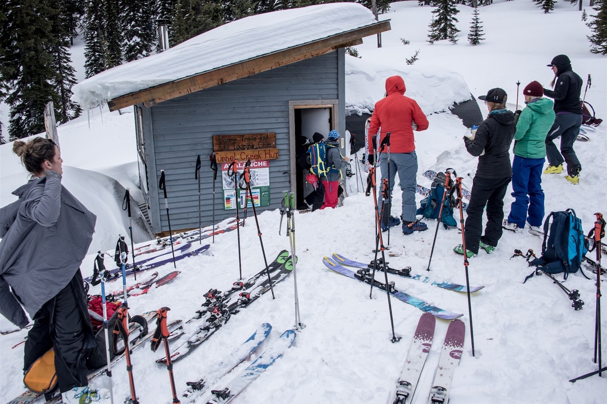 Visit local ski huts with the group