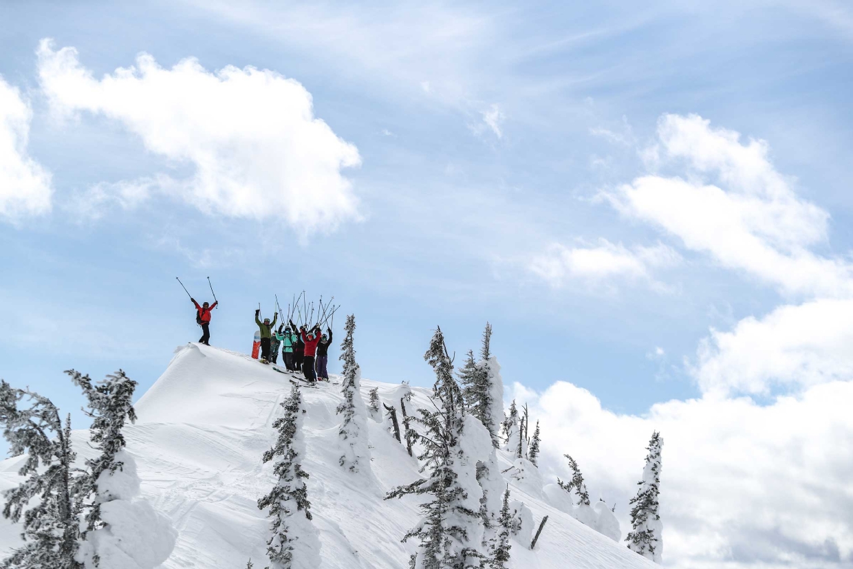 Experience an epic day cat skiing with your friends. Photo by Steve Reed