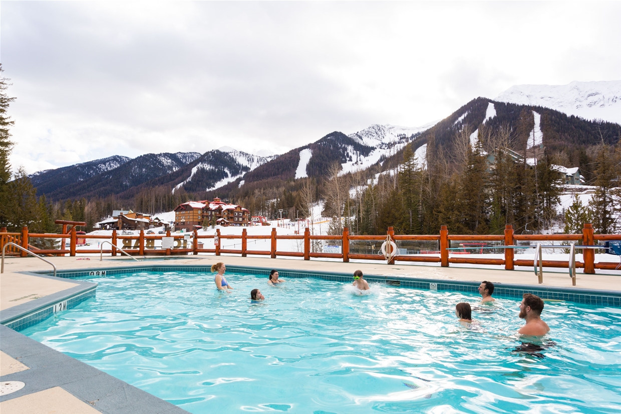 Relax in Lizard Creek Lodge's pool after a day skiing