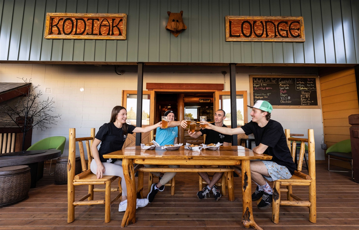 The Kodiak summer patio with drinks and food